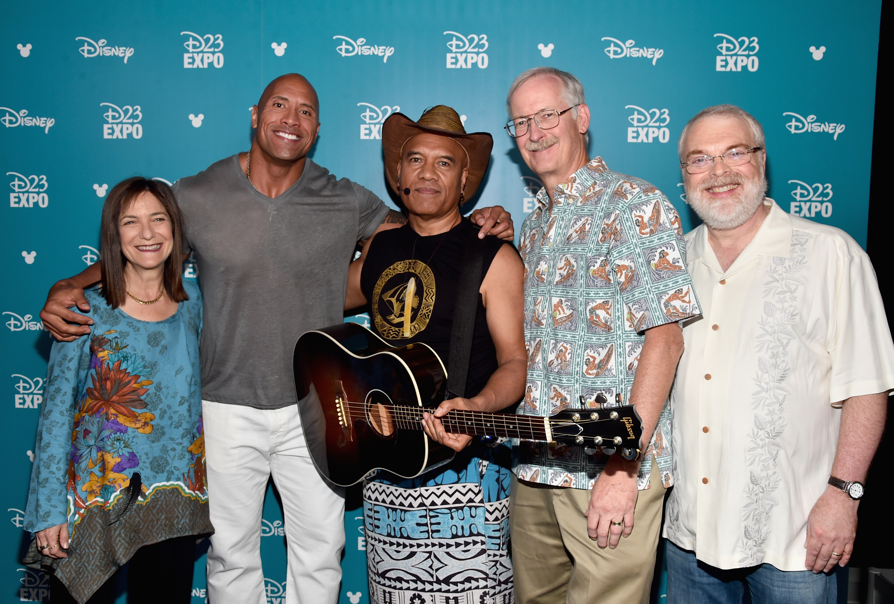(From Left: Osnat Shurer/Producer, Dwayne Johnson/Maui, Musician Opetai Foa’i, John Musker and Ron Clements/Directors. Photo from D23, copyright Disney