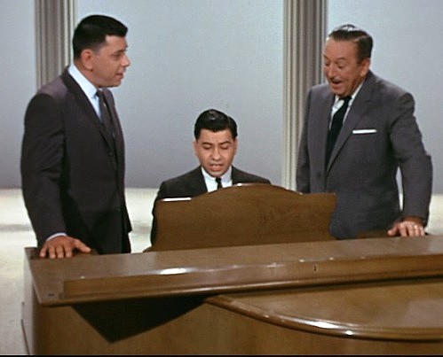 Richard Sherman (seated at piano) and his brother Robert, with Walt Disney