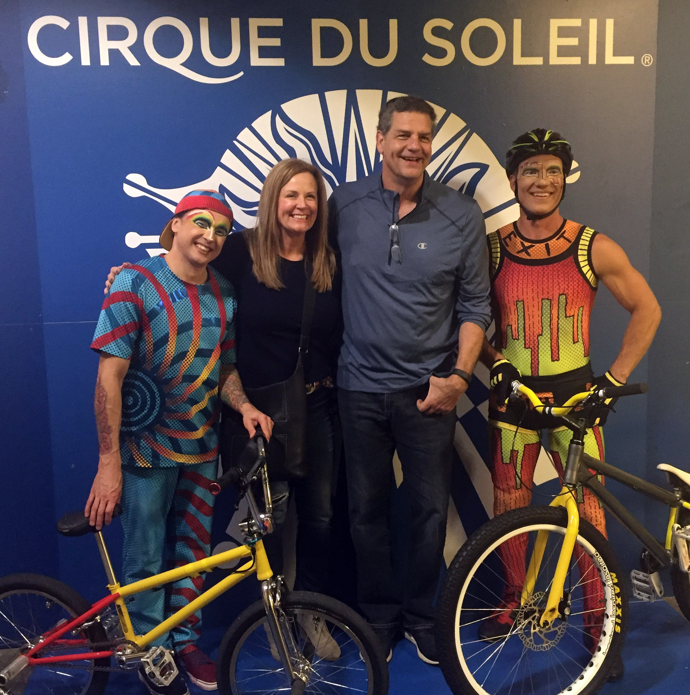 Mike Golic and his wife Christine Golic meet with some of the elite athletes of La Nouba by Cirque du Soleil