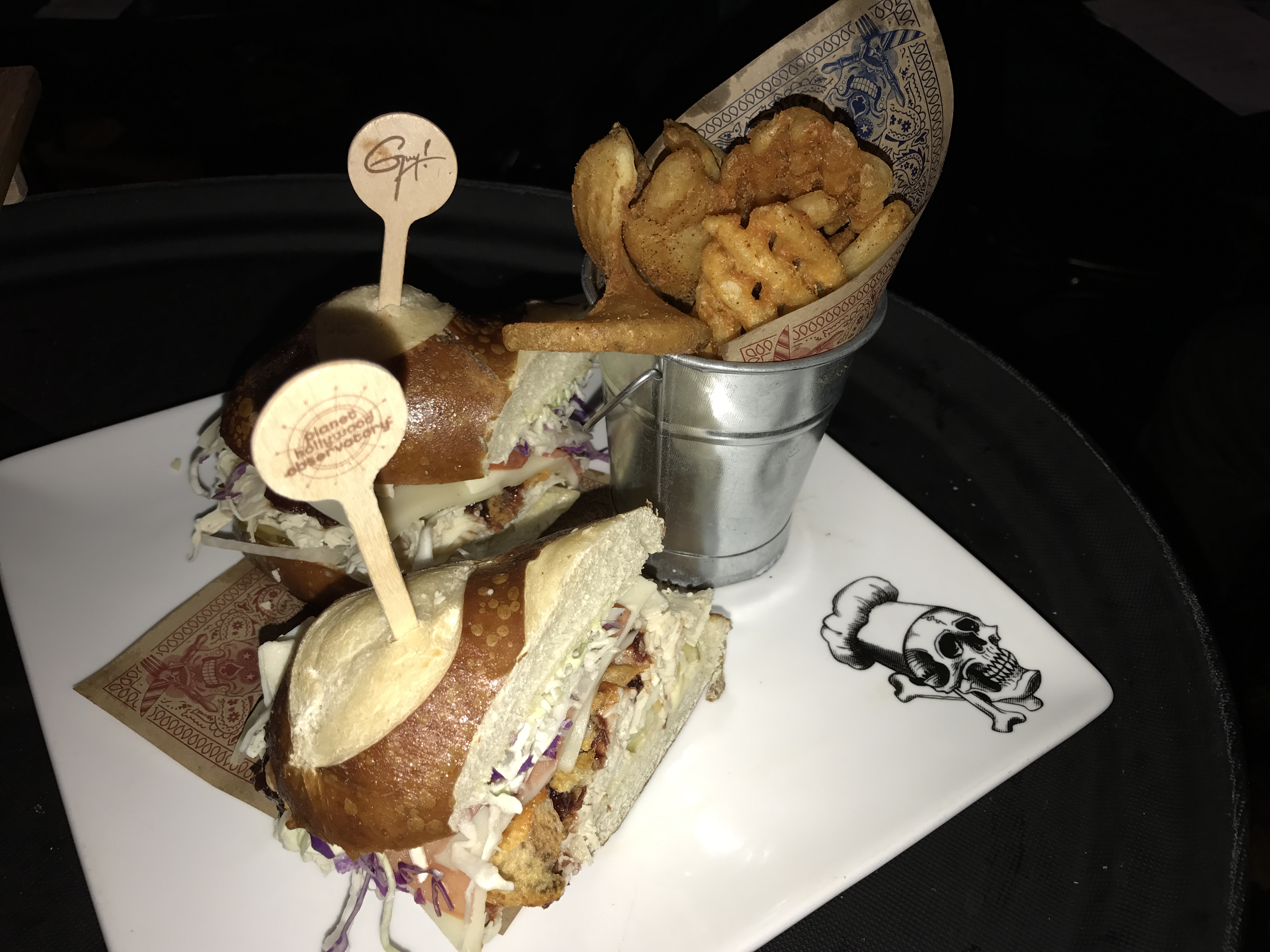 Turkey Pic-A-Nic - House-roasted turkey breast, cranberry, relish, Swiss, BBQ kettle chips, LTOP and donkey sauce on a garlic-buttered pretzel bun