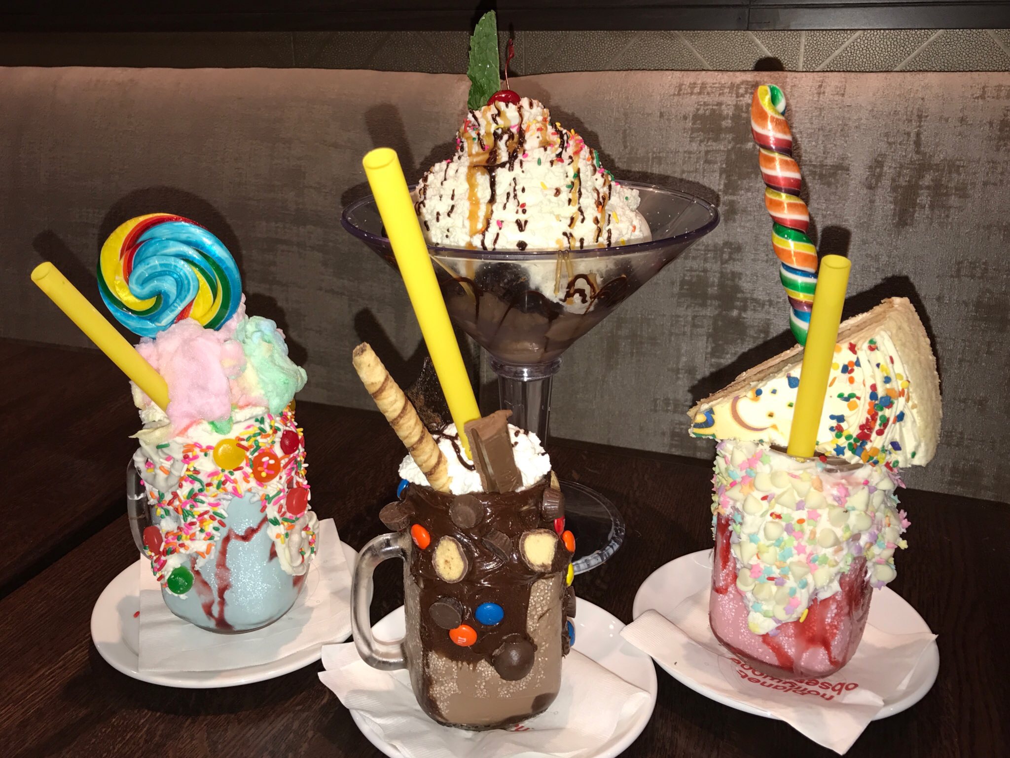 Cosmic Cotten Candy, Chocolate Comet, and Strawberry Big Bang (with a whole slice of birthday cake) are dwarfed by the Brownie Sundae Martini