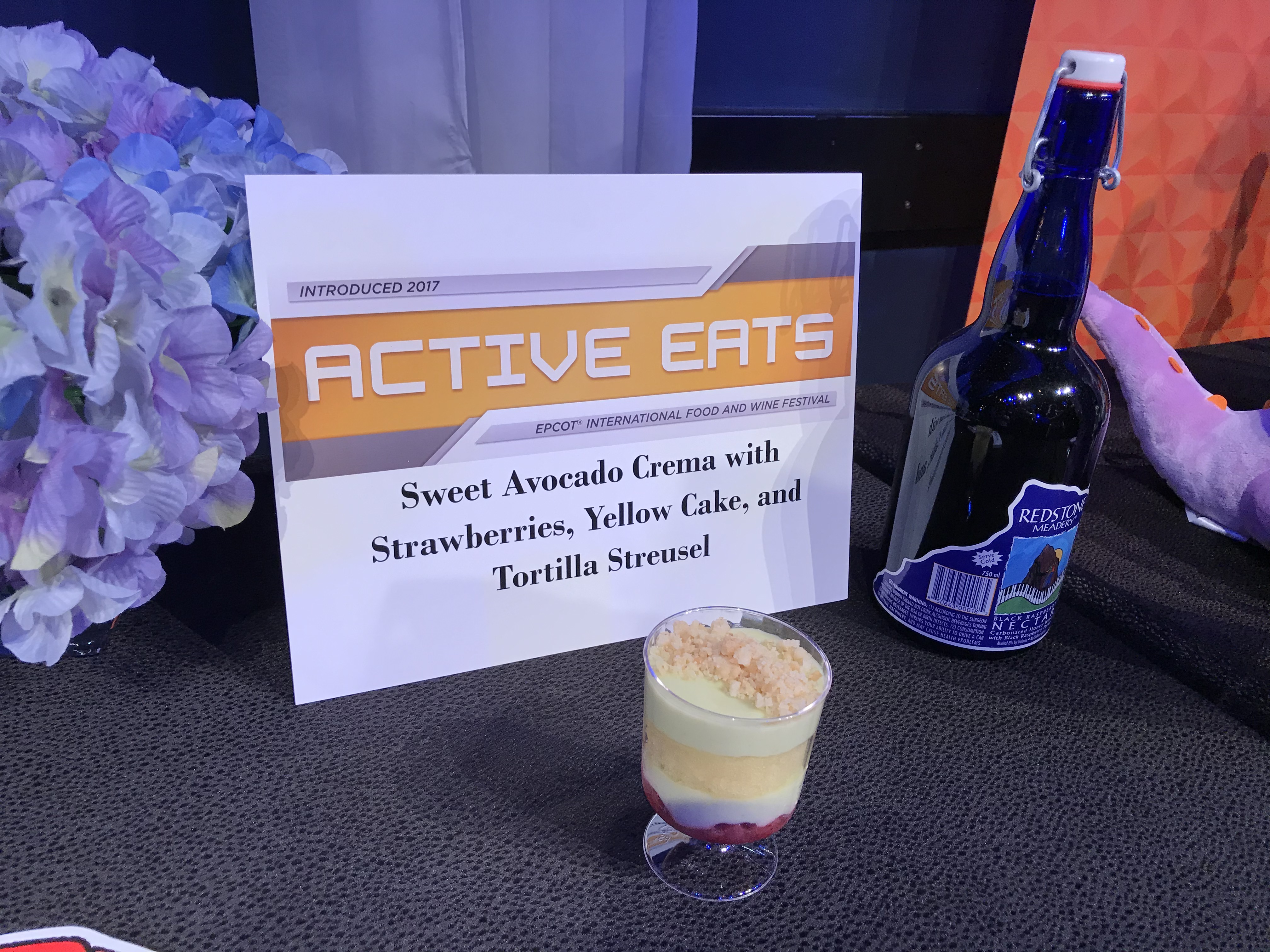 Epcot International Food & Wine Festival - Active Eats Marketplace Sweet Avocado Crema with Strawberries, Yellow Cake, and Tortilla Streusel