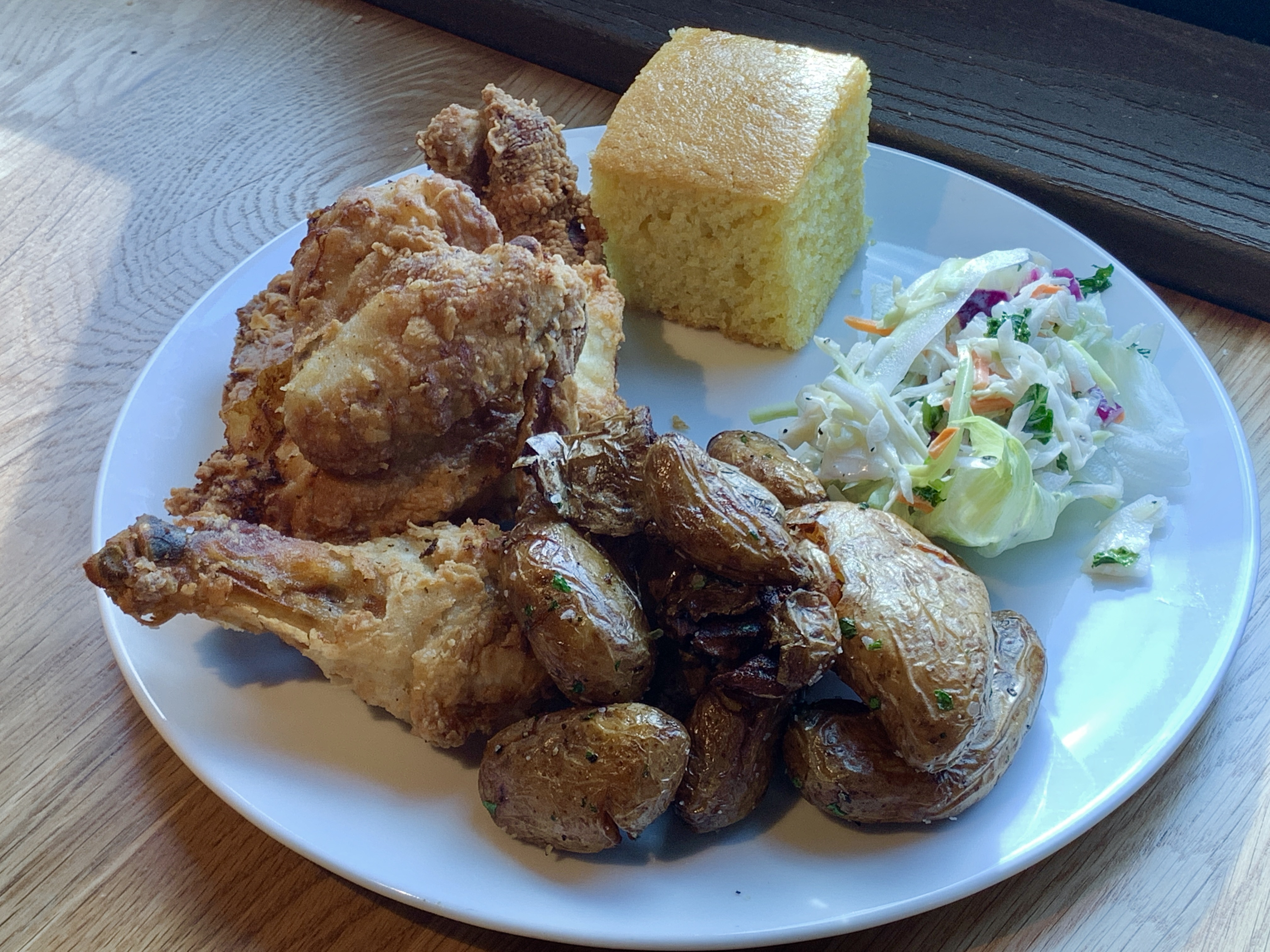 Buttermilk Fried Chicken - Crispy Smashed Potatoes, signature coleslaw, cornbread