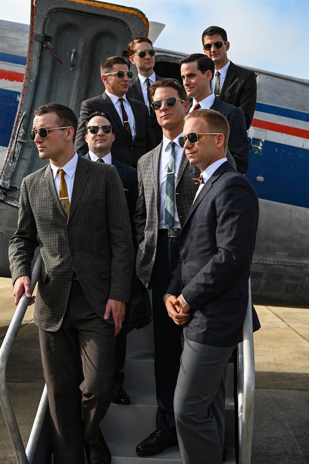 Left row front to back: Micah Stock, Danny Strong, Michael Trotter, Aaron Staton. Right row front to back: Patrick J. Adams, Jake McDorman, Colin O'Donoghue, James Lafferty (Credit: National Geographic/Gene Page)