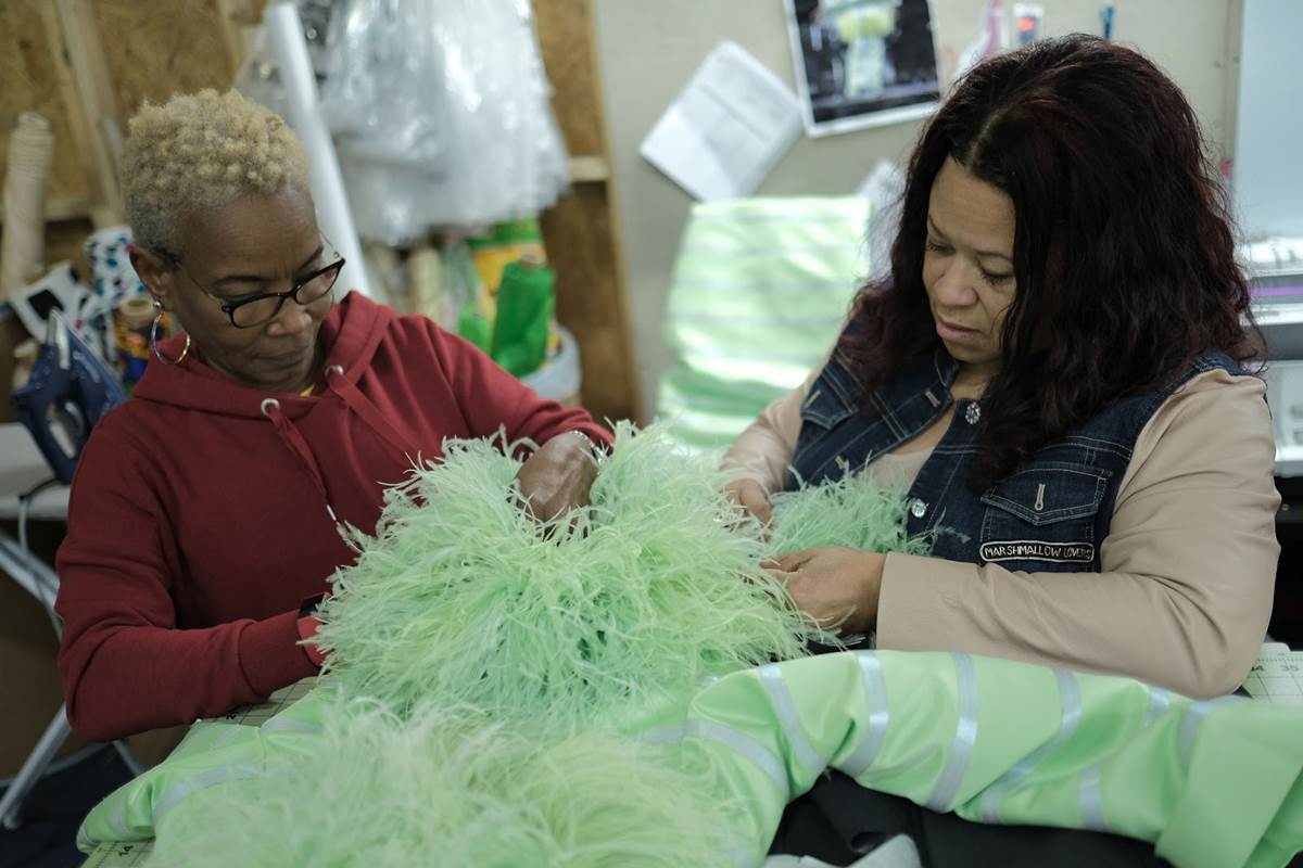 Costume Designer, Jennifer Bryan (L), works on wardrobe for National Geographic's GENIUS: ARETHA. (Credit: National Geographic/Richard Ducree)