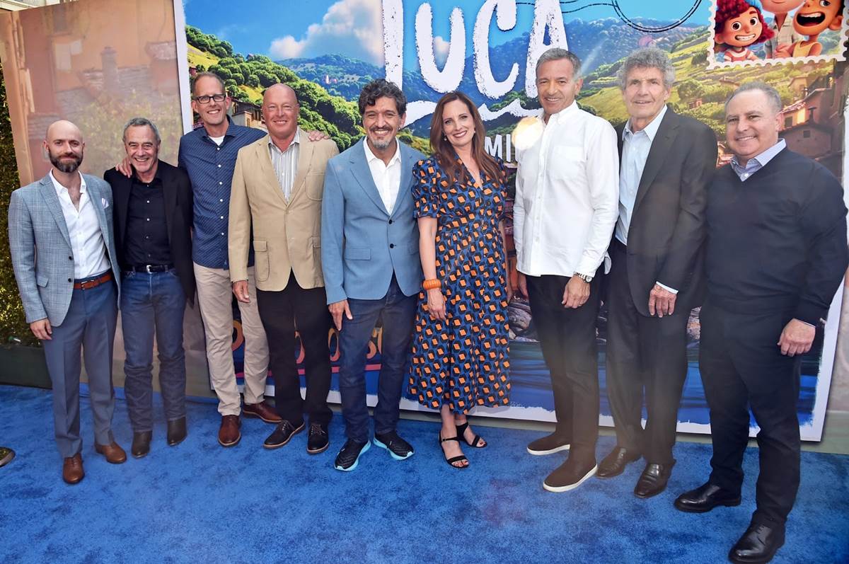 (L-R) Dan Romer, General Manager/President of Pixar Jim Morris, CCO of Pixar Pete Docter, CEO of The Walt Disney Company Bob Chapek, Enrico Casarosa, Andrea Warren, Executive Chairman of The Walt Disney Company Bob Iger, CCO of The Walt Disney Company Alan Horn, and Content Chairman at The Walt Disney Company Alan Bergman arrive at the world premiere for LUCA, held at the El Capitan Theatre in Hollywood, California on June 17, 2021. (Photo by Alberto E. Rodriguez/Getty Images for Disney)