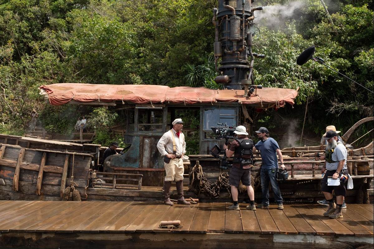 Dwayne Johnson and director Jaume Collet-Serra on the set of Disney’s JUNGLE CRUISE. Photo by Frank Masi. © 2021 Disney Enterprises, Inc. All Rights Reserved.