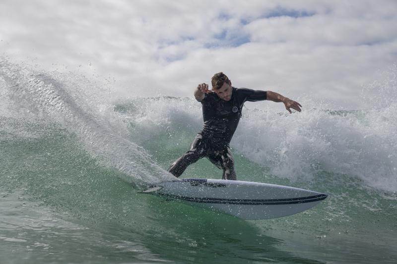 Chris Hemsworth surfing. (National Geographic/Craig Parry)