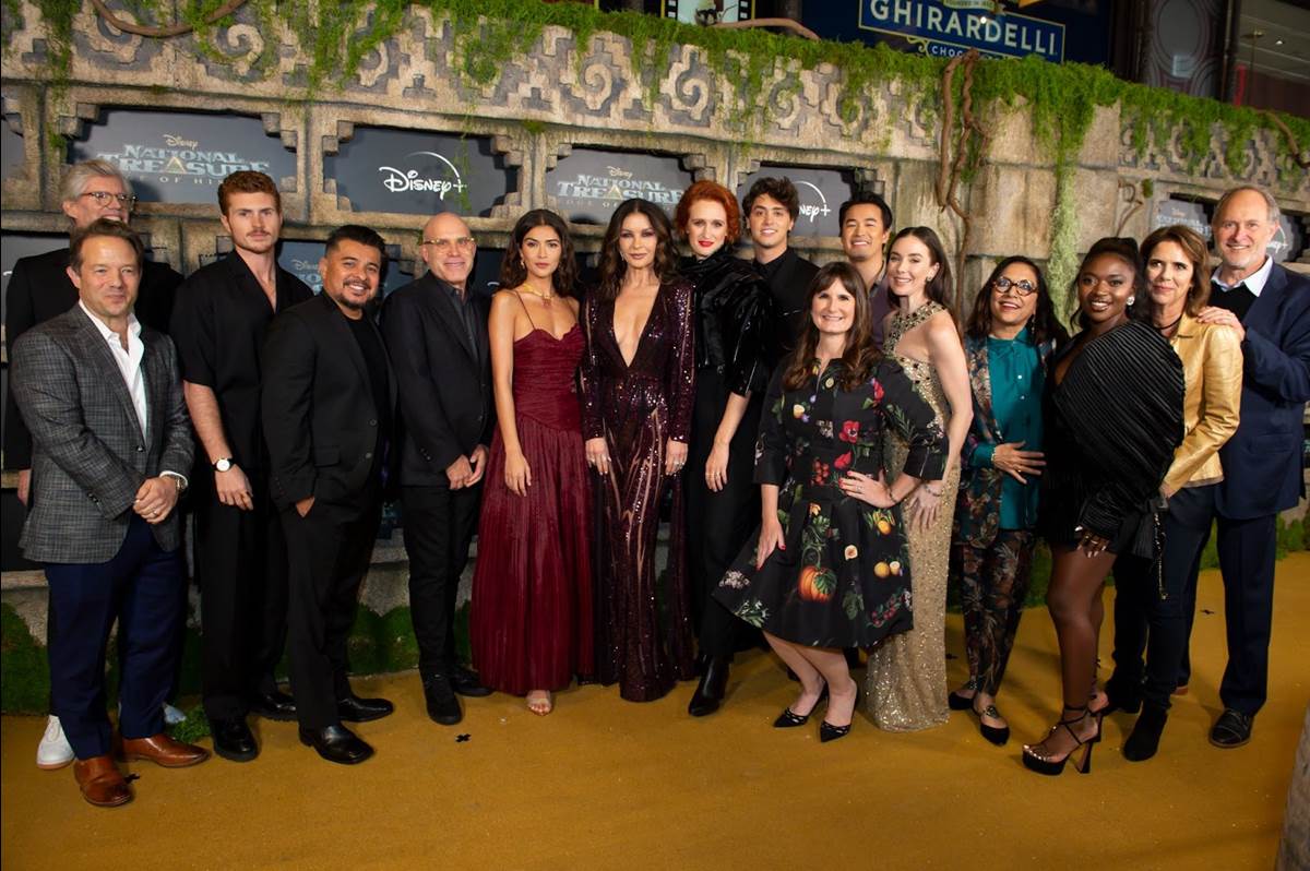 LEFT TO RIGHT: RICK MUIRRAGUI (EXECUTIVE PRODUCER), CORMAC WIBBERLEY (EXECUTIVE PRODUCER/SHOWRUNNER), JAKE AUSTIN WALKER, JACOB VARGAS, JOHN LITTMAN (EXECUTIVE PRODUCER), LISETTE OLIVERA, CATHERINE ZETA-JONES, BREEDA WOOL, ANTONIO CIPRIANO, KRISTIEANNE REED (EXECUTIVE PRODUCER), JORDAN RODRIGUES, LYNDON SMITH, MIRA NAIR (EXECUTIVE PRODUCER), ZURI REED, MARIANNE WIBBERLEY (EXECUTIVE PRODUCER/SHOWRUNNER), JONATHAN LITTMAN (EXECUTIVE PRODUCER)
(Disney/PictureGroup)