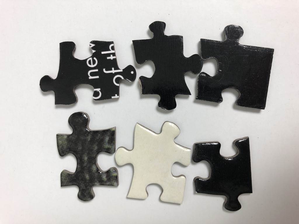 It's hard to tell from the picture, but the top pieces are the "Back Side" and the bottom row are "Front Side"