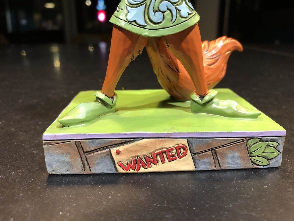 "Wanted" sign on base.