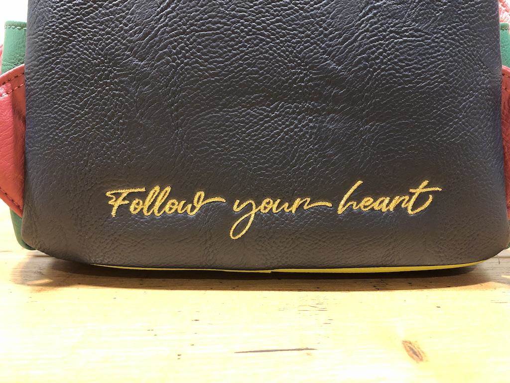 Follow your heart scripted embroidery.