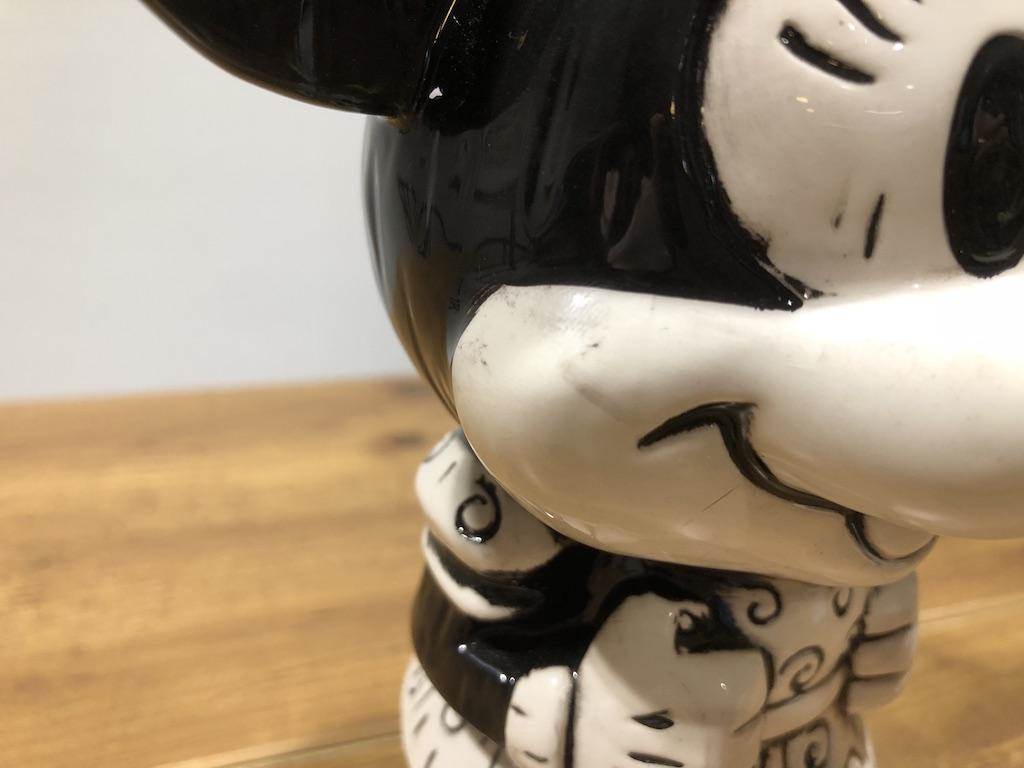 Smudge on her cheek or distressed aesthetic?