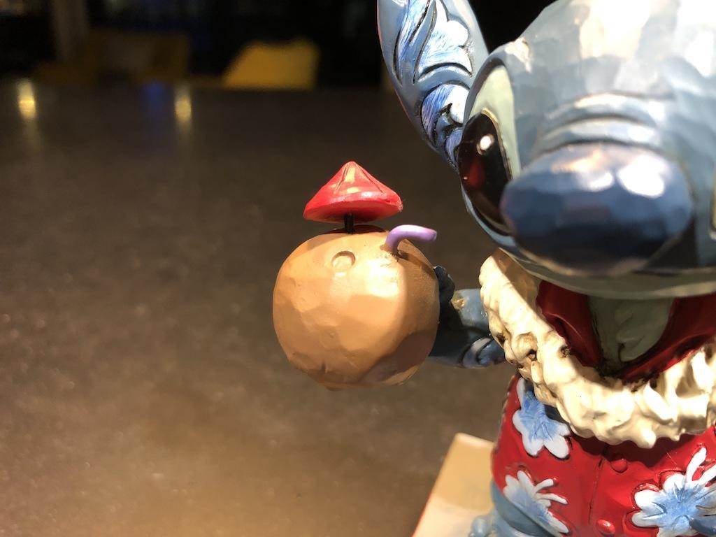 I love that Stitch is drinking from a coconut.