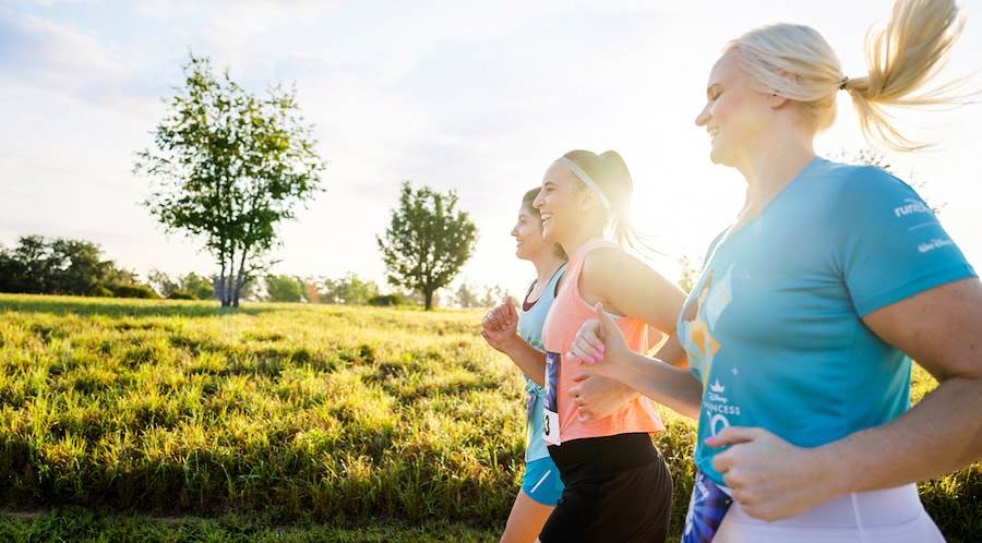 Friends running a Virtual Walt Disney World Marathon Weekend race