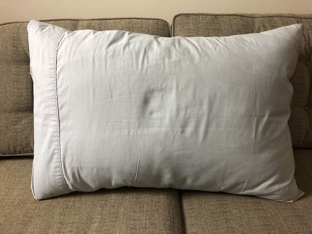 Queen pillow just fits in the Queen pillowcase