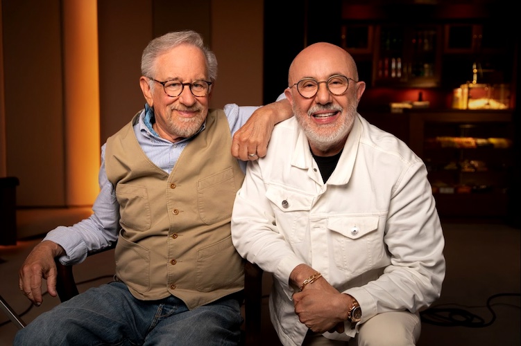 Laurent Bouzereau (right) poses with filmmaker Steven Spielberg on the set of 'Jaws @ 50.'