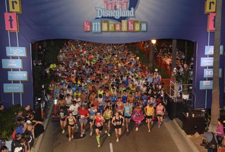 Runners cross the start line of the eighth Disneyland Half Marathon