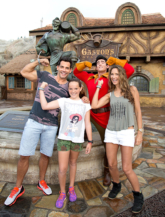 Cristian de la Fuente with Gaston at New Fantasyland in the Magic Kingdom Park with his wife, actress Angélica Castro, and daughter Laura