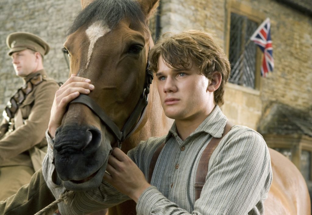"WAR HORSE" DM-AC-00047 Albert (Jeremy Irvine) and his horse Joey are featured in this scene from DreamWorks Pictures' "War Horse", director Steven Spielberg's epic adventure for audiences of all ages, set against a sweeping canvas of rural England and Europe during the First World War. Ph: Andrew Cooper, SMPSP ©DreamWorks II Distribution Co., LLC.  All Rights Reserved.
