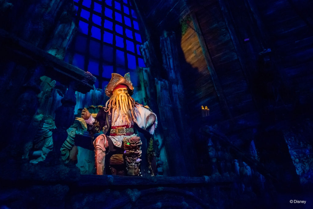 MAKING A DEAL WITH DAVY JONES –– Pirates of the Caribbean: Battle for the Sunken Treasure is a spectacular indoor boat ride that takes guests on a new rollicking adventure with Captain Jack Sparrow to steal the priceless treasure of Davy Jones. The Shanghai Disneyland attraction is the newest iteration of the classic attraction, which opened at Disneyland park in 1967. (Disney)