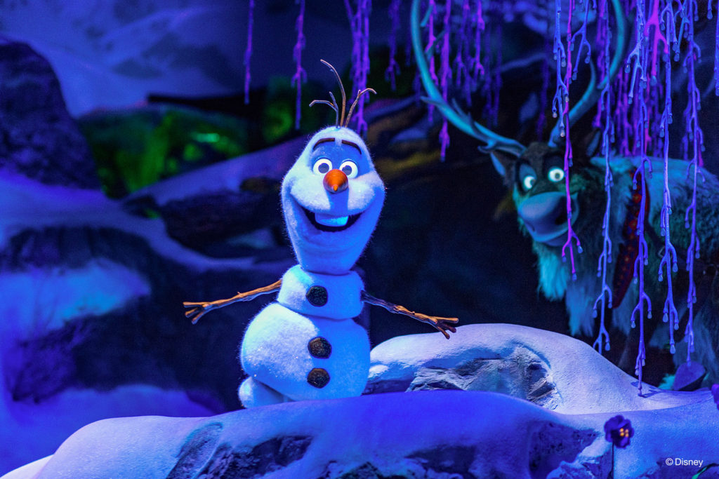 FROZEN FEVER –– Olaf and Sven greet guests on their voyage to Elsa’s ice palace in the new attraction Frozen Ever After in Epcot at Walt Disney World. (Disney)