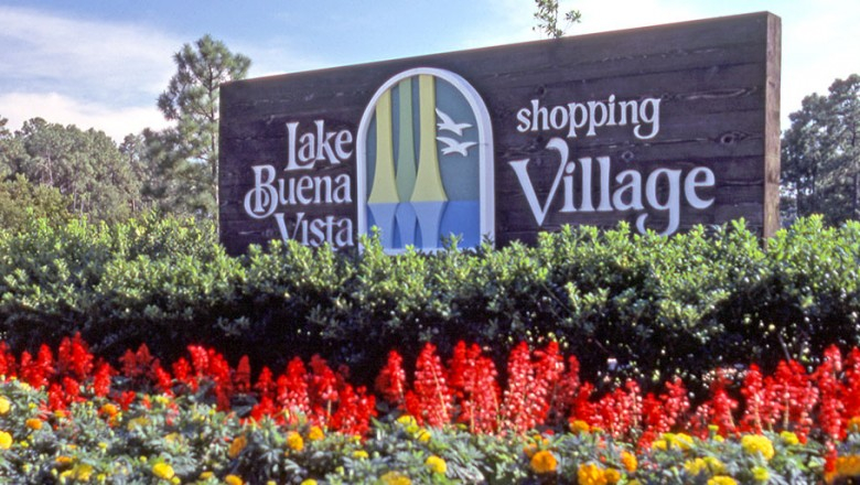 In what year did the Lake Buena Vista Shopping Village, the precursor to Disney Springs, open?