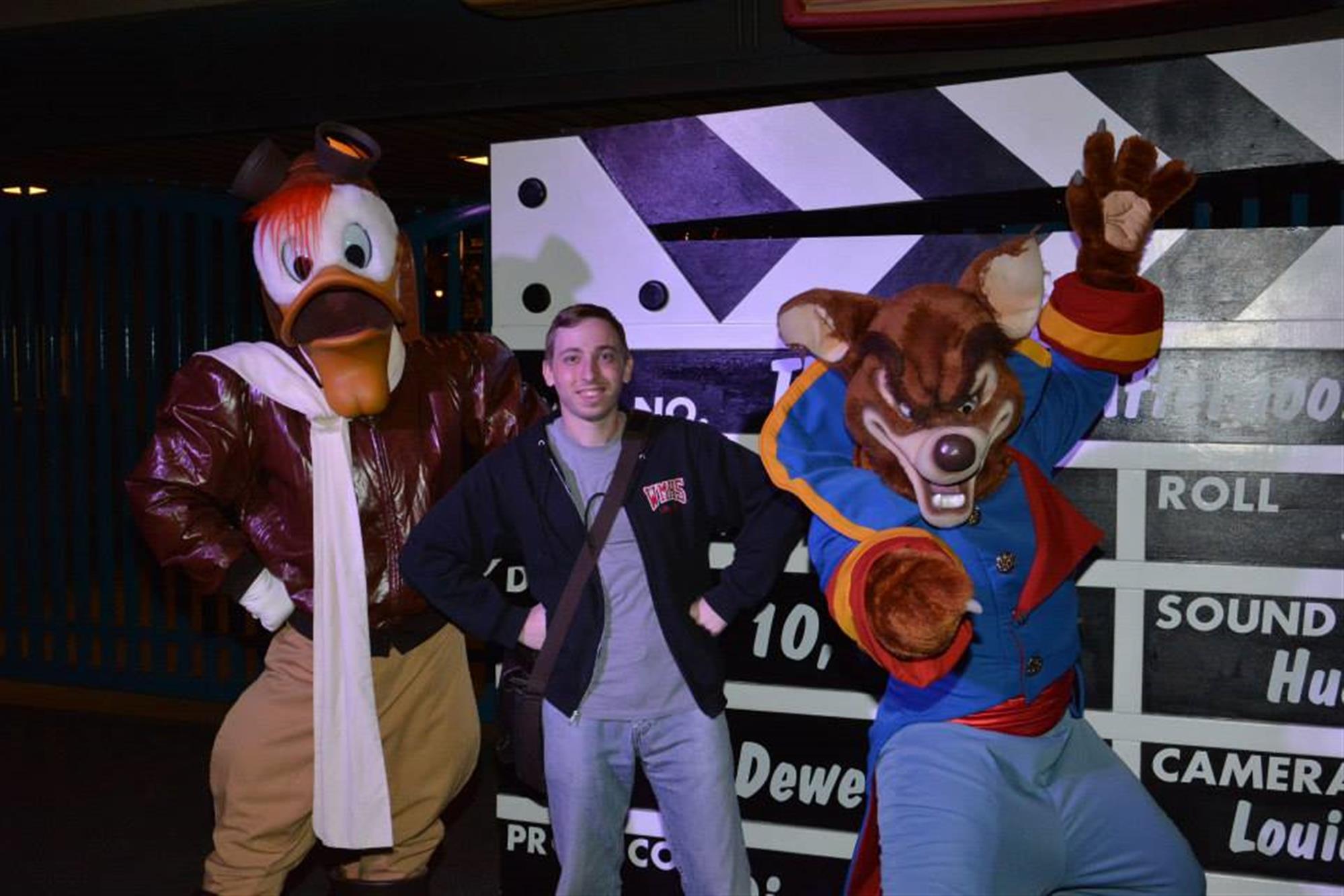 Kyle hangs with Launchpad McQuack and Don Karnage at Disneyland in 2014