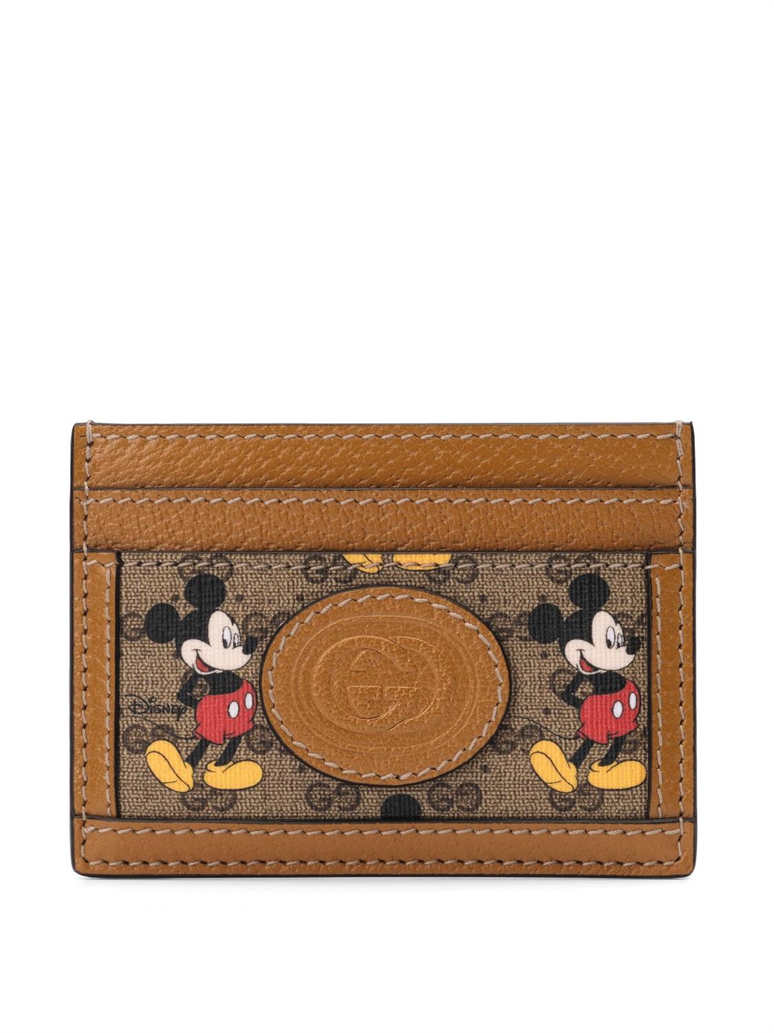 gucci on X: Luggage and accessories from the #DisneyXGucci collection to  celebrate the Year of the Mouse, crafted in GG motif printed with Mickey  Mouse and trimmed in leather. ©Disney  /