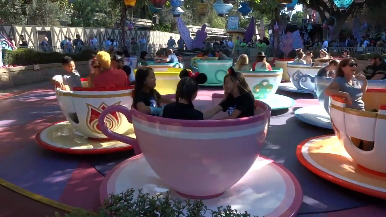 https://www.laughingplace.com/w/wp-content/uploads/2020/04/moment-of-disney-bliss-mad-tea-party-at-disneyland.png