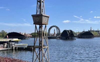 The Third of the Four "Harmonius" Barges Makes Its Way to World Showcase Lagoon at EPCOT