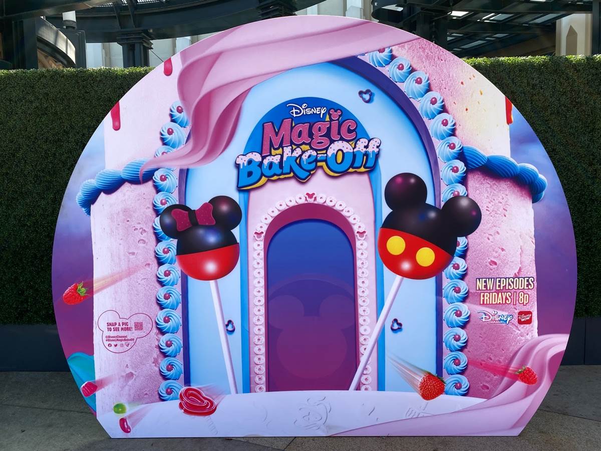 https://www.laughingplace.com/w/wp-content/uploads/2021/08/disneys-magic-bake-off-posters-and-photo-op-appears-at-downtown-disney-2.jpeg