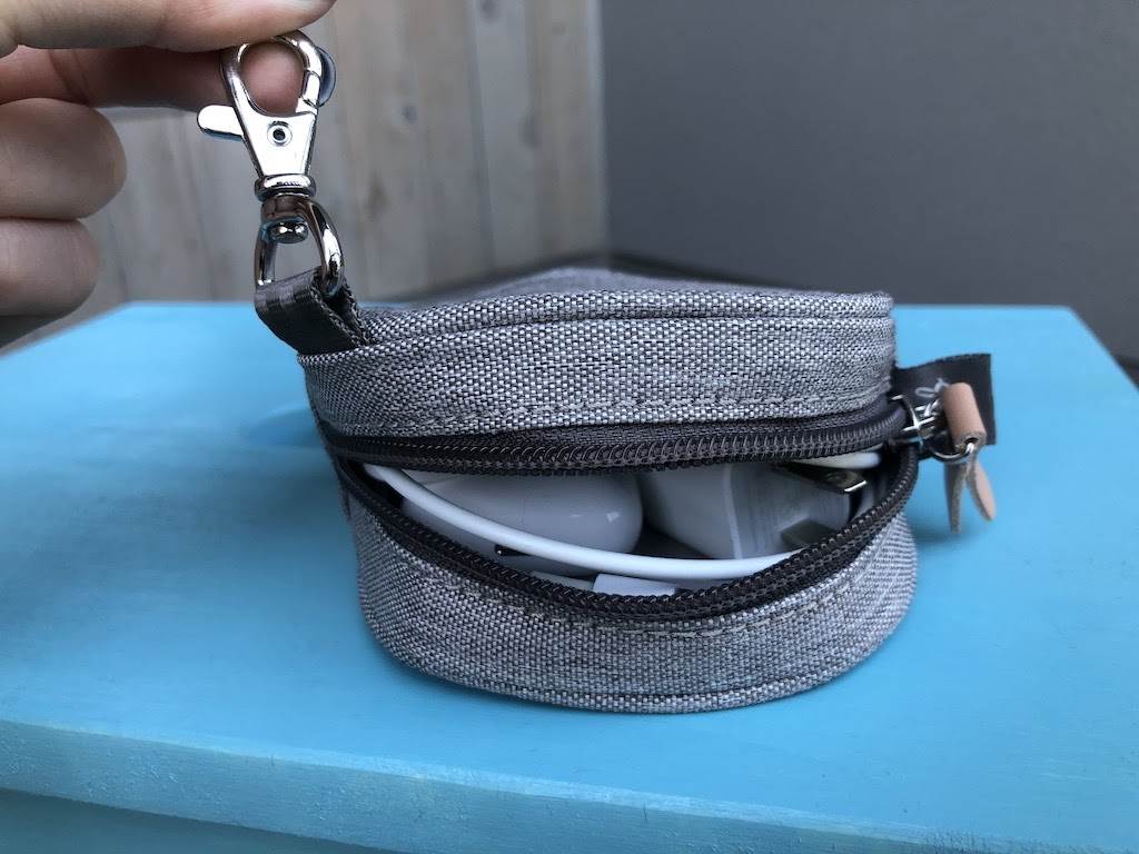 Hunny pouch holds my phone cords and Airpods