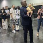 Actor Giancarlo Esposito Finally Gets Grogu In His Clutches At Star Wars Celebration