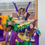 Universal Orlando Resort Surprised Travelers with a Pop-Up Mardi Gras Celebration at MCO