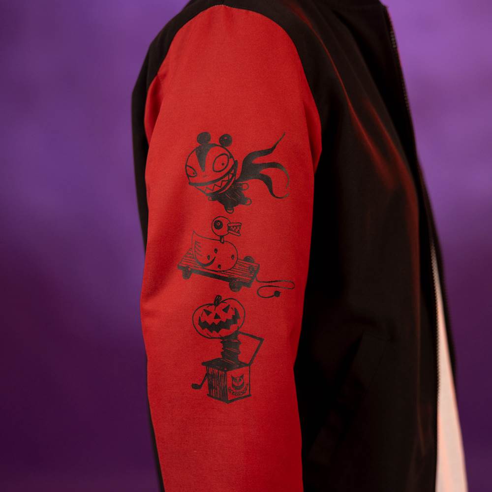 The "Sandy Claws" side has red sleeves decorated with some scary presents.