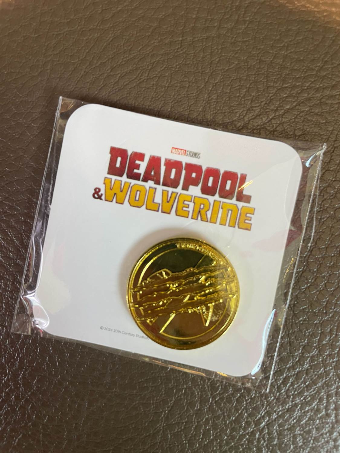 “Deadpool & Wolverine” Claw Machine Pops Up At Theaters Across The