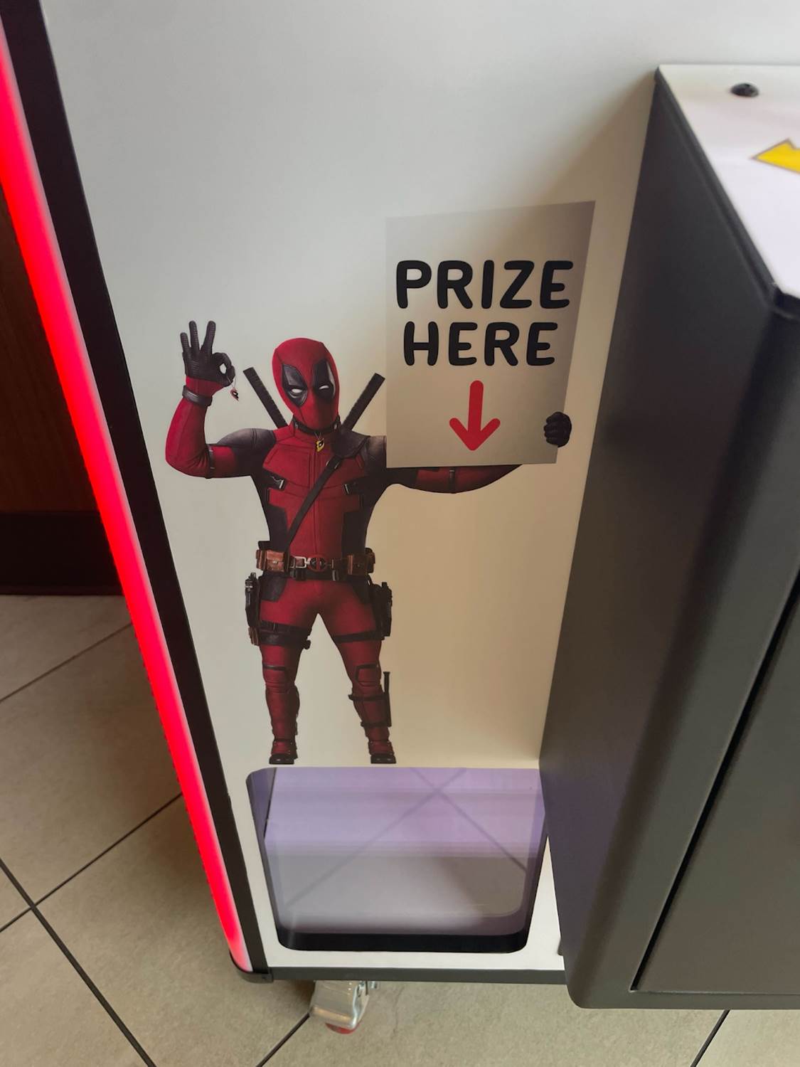 “Deadpool & Wolverine” Claw Machine Pops Up At Theaters Across The