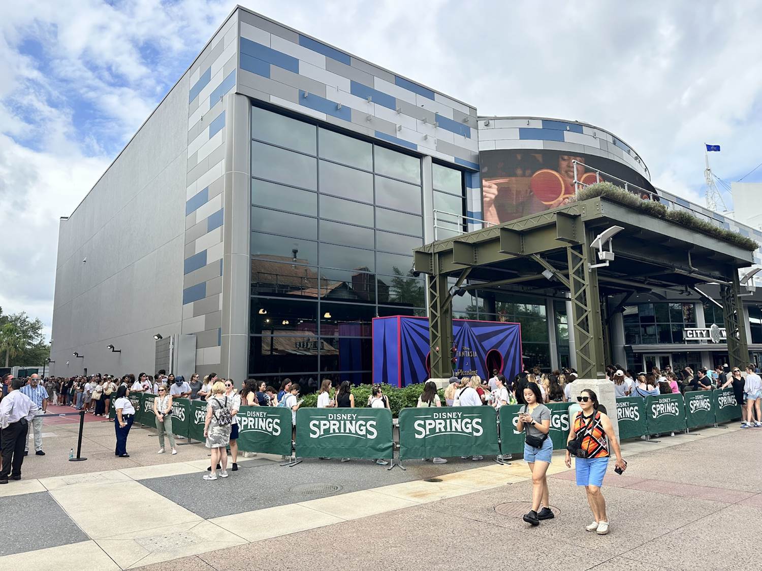 Photos Harry Styles Fans Descend Upon Disney Springs as “Fantasia” x